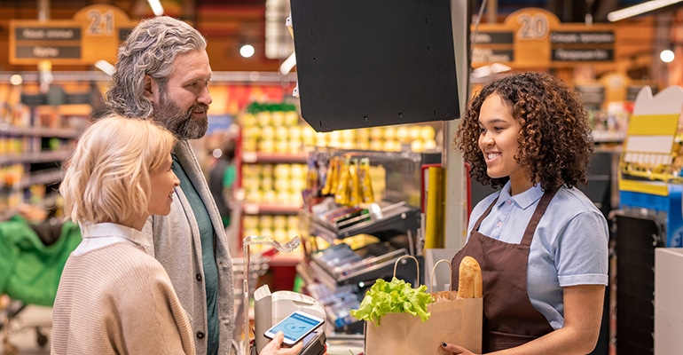 satisfied shoppers at checkout