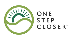 The One Step Closer logo is a green sun rising over a green hill, both enclosed by a green circle.  The One Step Closer logo is a green sun rising over a green hill, both enclosed by a green circle.