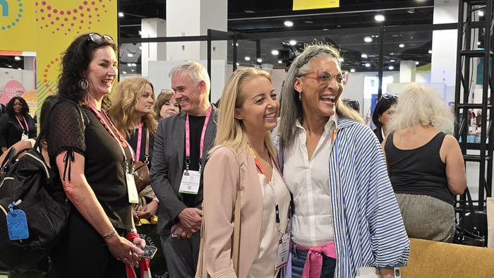 After her keynote at Newtopia Now, Carla Hall visits with audience members, shaking hands, signing autographs and taking photos. Credit: Victoria A.F. Camron After her keynote at Newtopia Now, Carla Hall visits with audience members, shaking hands, signing autographs and taking photos. Credit: Victoria A.F. Camron