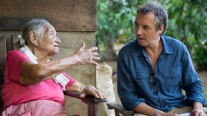 Dan Buettner, right, talks with a woman while researching Blue Zones. Credit: David McLain Dan Buettner, right, talks with a woman while researching Blue Zones. Credit: David McLain