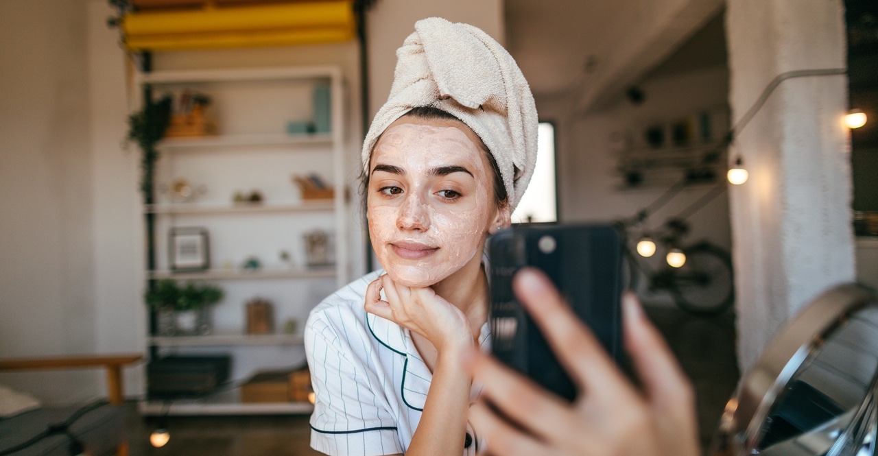 Woman posing in front of cell phone