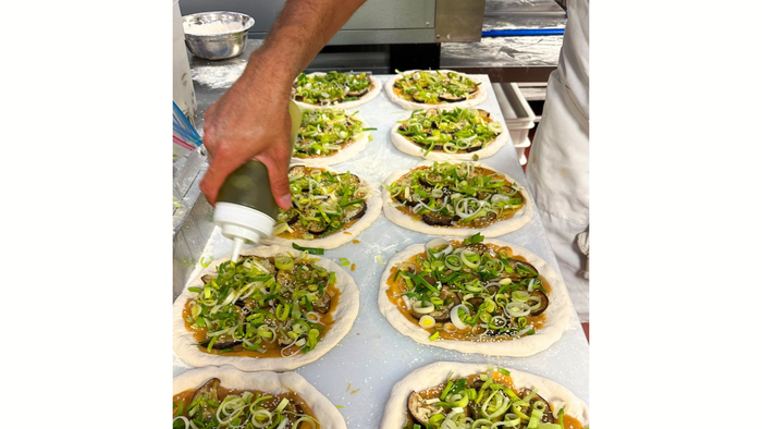 At Newtopia Now, Melody Stein's miso-eggplant pizza was chosen as a finalist for the 2025 Expo West NEXTY Awards.  At Newtopia Now, Melody Stein's miso-eggplant pizza was chosen as a finalist for the 2025 Expo West NEXTY Awards.