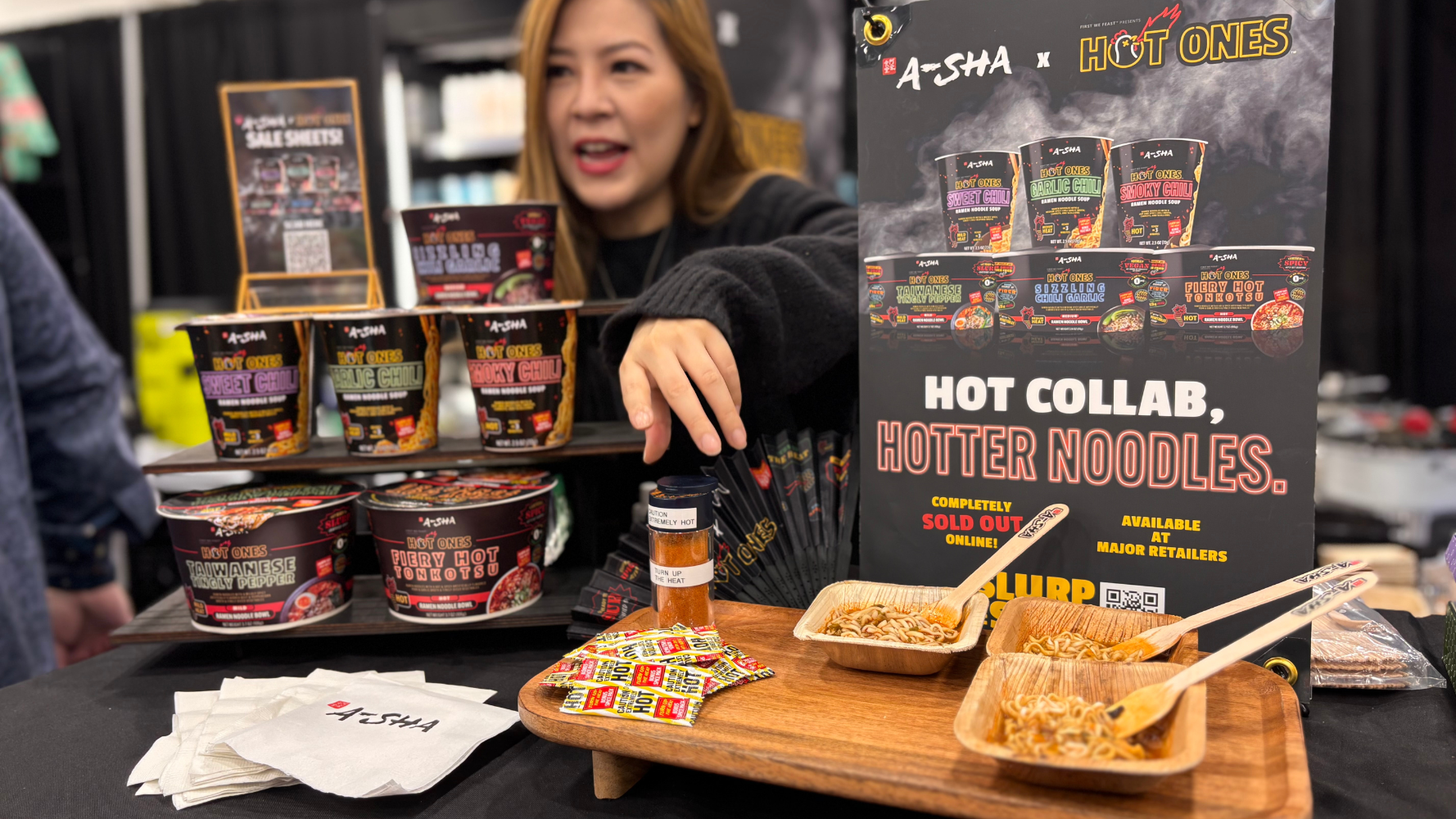 A-Sha's noodle bowls on display, with samples available for tasting, at the Fancy Food Show. A-Sha's noodle bowls on display, with samples available for tasting, at the Fancy Food Show.