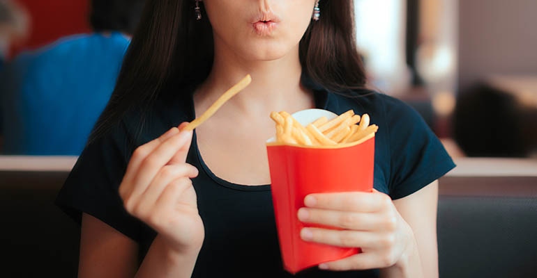 woman-eating-fries.jpg