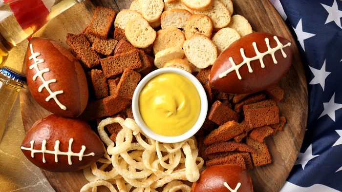 Snacks on a platter with footballs symbolizing Super Bowl snacking Snacks on a platter with footballs symbolizing Super Bowl snacking