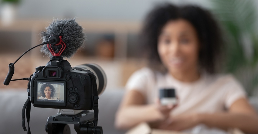 Woman shooting video Woman shooting video