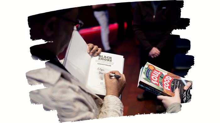 Adrian Miller signs a copy of “Black Smoke: African Americans and the United States of Barbecue,” at Metropolitan State University of Denver in February. “Black Smoke” won the 2022 James Beard Award for Reference and Scholarship. Credit: Soul Food Scholar Adrian Miller signs a copy of “Black Smoke: African Americans and the United States of Barbecue,” at Metropolitan State University of Denver in February. “Black Smoke” won the 2022 James Beard Award for Reference and Scholarship. Credit: Soul Food Scholar