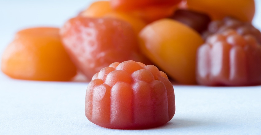 gummies supplements on blue background