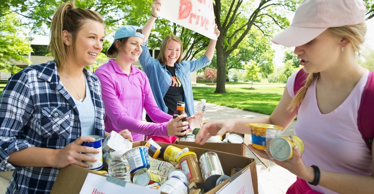 People Donating to a Food Drive