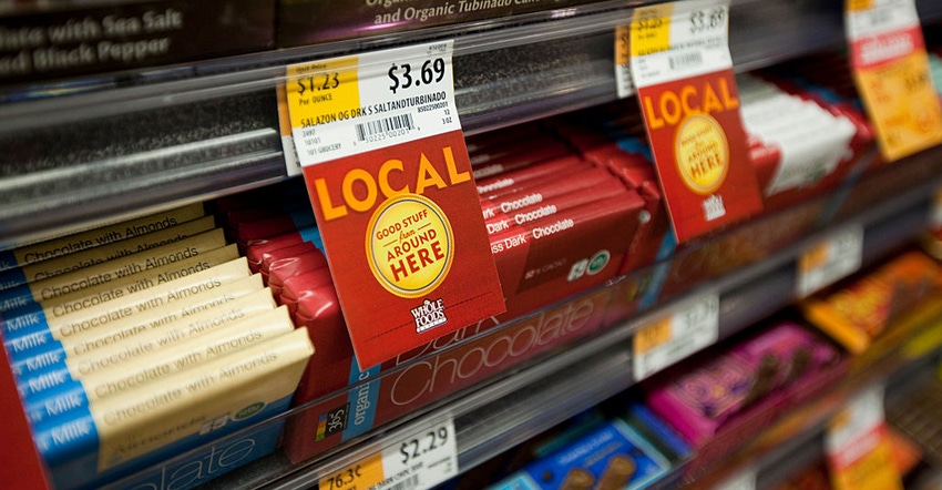 Local labels on Whole Foods shelves
