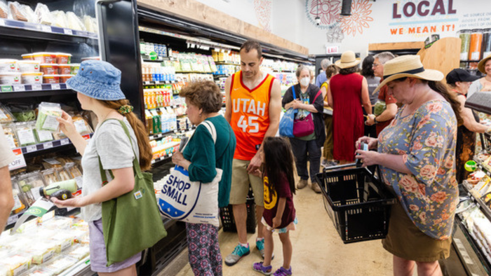 Rogers Park residents shop the dairy aisle at Wild Onion Market. Rogers Park residents shop the dairy aisle at Wild Onion Market.