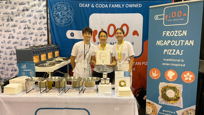 From left, Rylan, Melody and Tasyia Stein pose at their Newtopia Now booth, where they made pizzas for thousands of people. From left, Rylan, Melody and Tasyia Stein pose at their Newtopia Now booth, where they made pizzas for thousands of people.