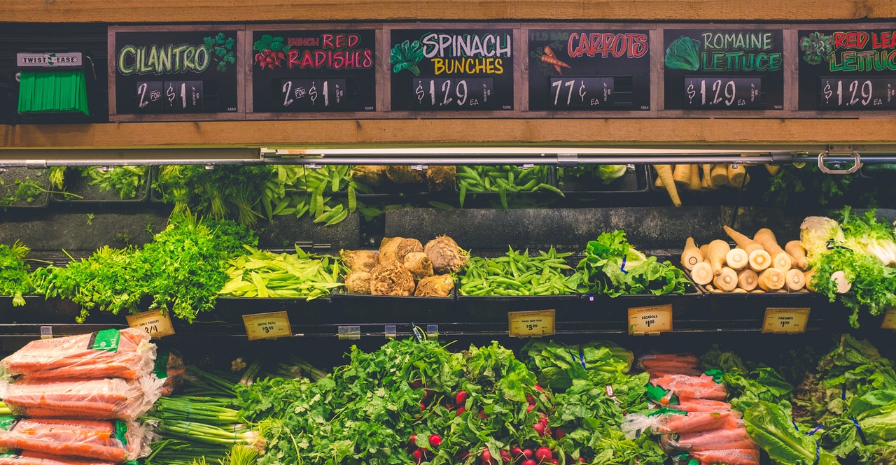 produce signage at natural retail store