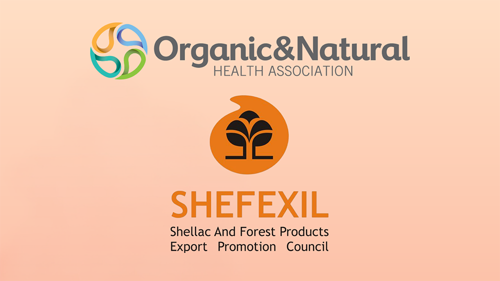 Logos of Organic & Natural Health Association and SHEFEXIL on a peach background