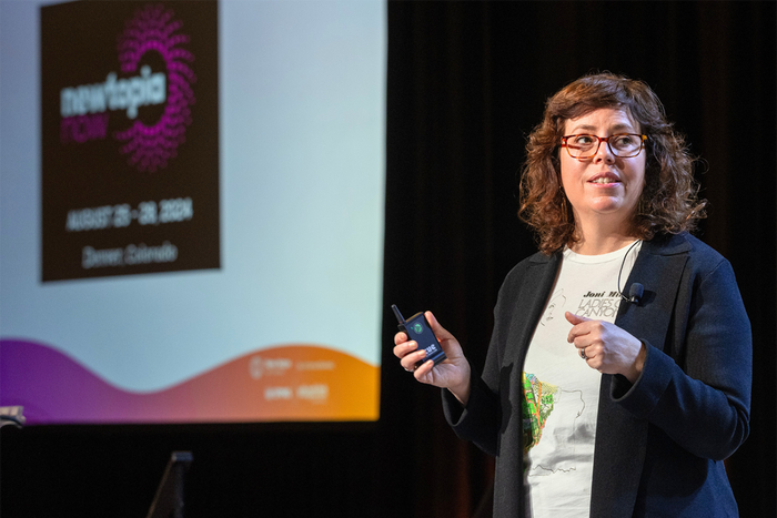 At Natural Products Expo East 2024, New Hope Network's Carlotta Mast announces the debut of a newly imagined trade show, Newtopia Now. Credit: Bryan Beasley Photography At Natural Products Expo East 2024, New Hope Network's Carlotta Mast announces the debut of a newly imagined trade show, Newtopia Now. Credit: Bryan Beasley Photography