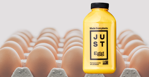 Just Egg bottle in front of carton of brown eggs