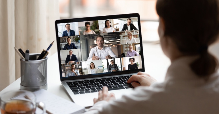 Person on a Video Conference Meeting on a Laptop Computer