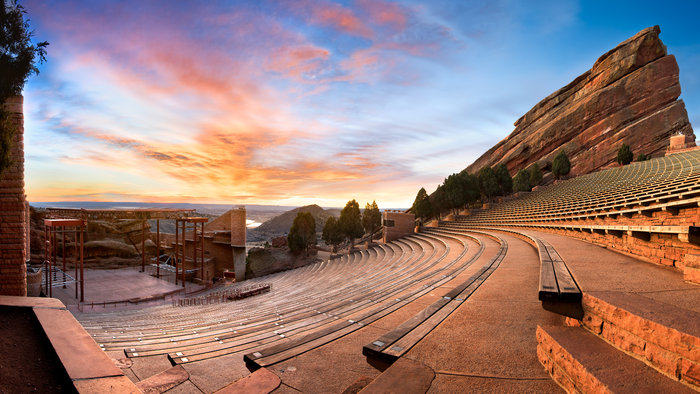 Red Rocks Park and Amphitheatre, in the Rocky Mountain foothills, is both a park and an historic concert venue. Credit: Canva