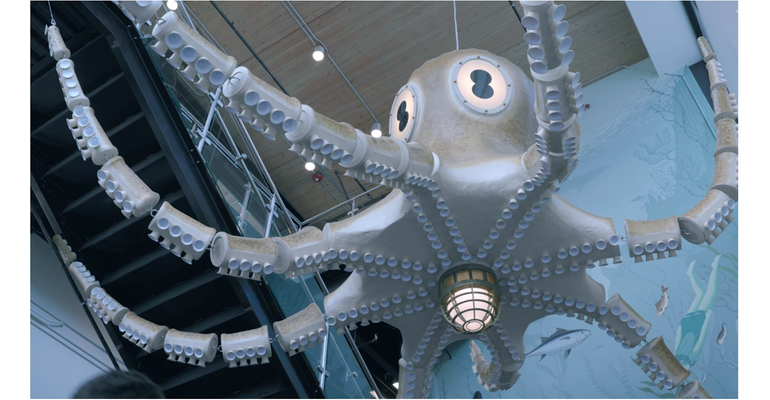 PCC Community Markets' Ballard, Washington, location, features a two-story octopus light fixture in the entryway.
