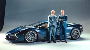 Lamborghini Design Director Mitja Borkert (r) and Ugo Riccio, Coordinator of Aerodynamics, with the Revuelto.