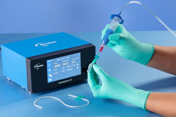 Manual application of assembly fluid onto a catheter using an UltimusPlus fluid dispenser and Class VI disposable syringe_web.jpg