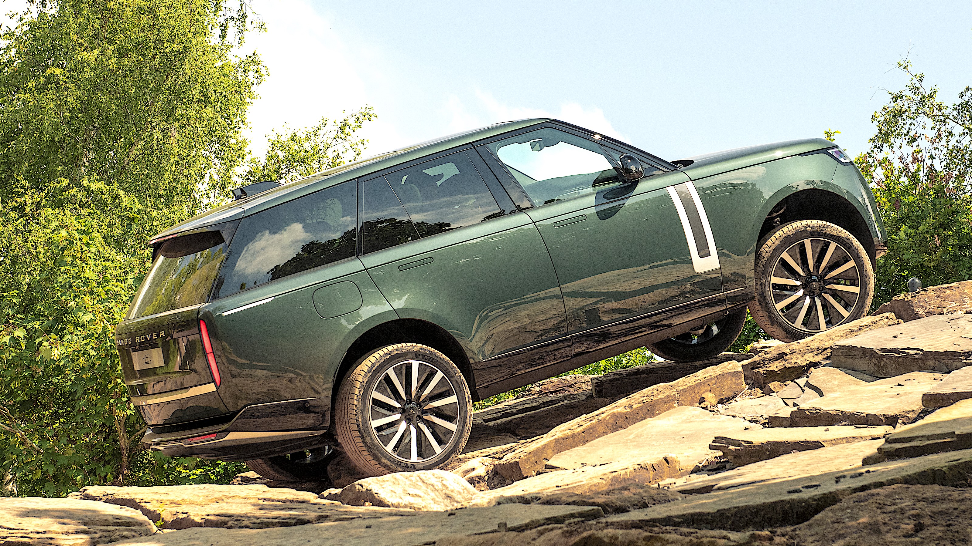 Range Rover Electric climbing rocks