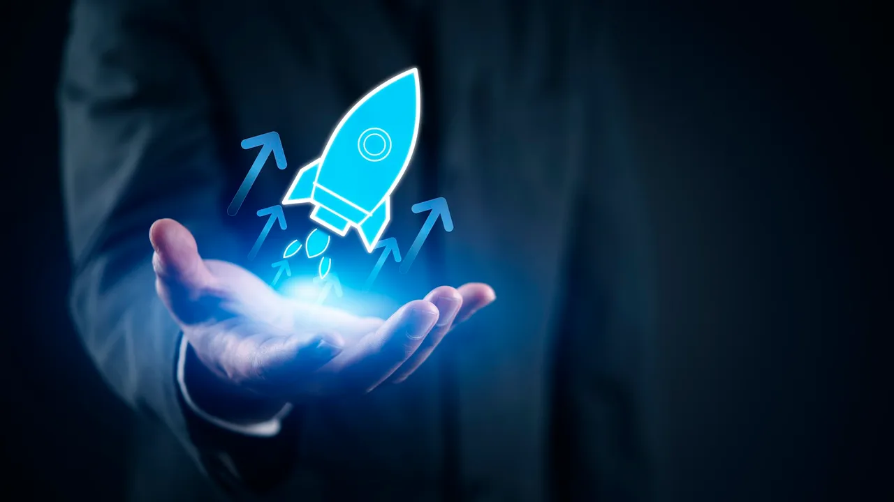 founder holding a rocket to represent a startup business founder holding a rocket to represent a startup business