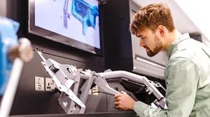a hybrid steel-and-plastic cross-car beam a hybrid steel-and-plastic cross-car beam