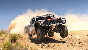 An off-road racing truck is an eye-catching example of dirt-racing vehicles. An off-road racing truck is an eye-catching example of dirt-racing vehicles.