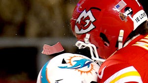 Kansas City Chiefs quarterback Patrick Mahomes's helmet shatters on impact with Miami Dolphins safety DeShon Elliott.