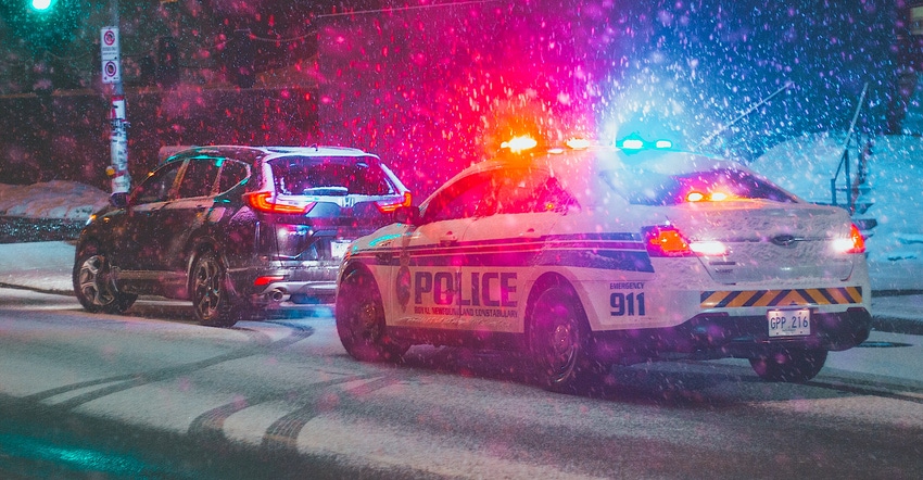 erik-mclean-winter police car-unsplash.jpg