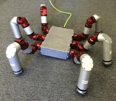 Video: Reconfigurable Robot Walks on Snake Legs