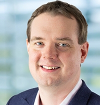 Head and shoulder photograph of Author Chris Gallacher