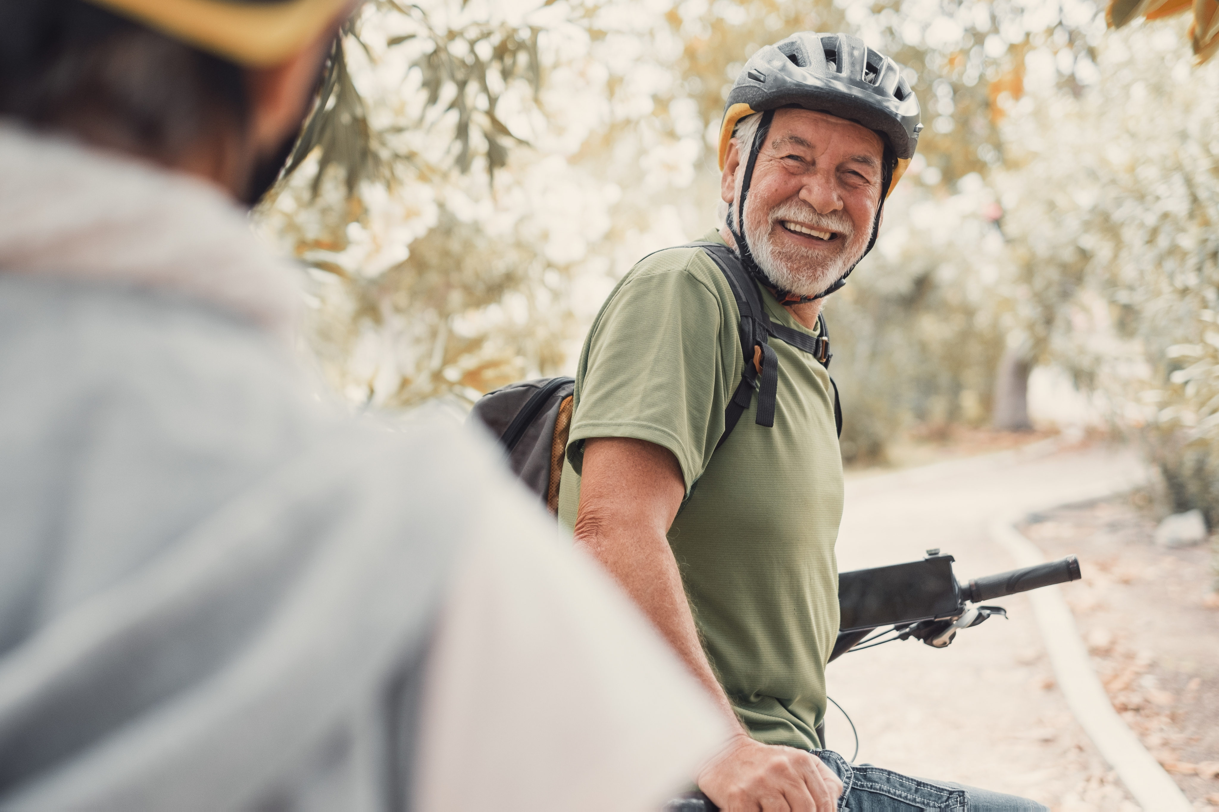 Man smiling on a bike ride
