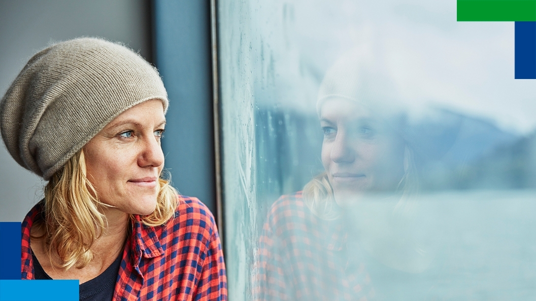 Lady staring out of window