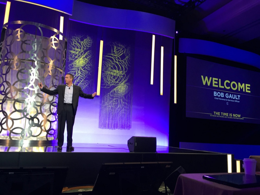 Extreme Networks' Bob Gault on stage at the company's global partner summit