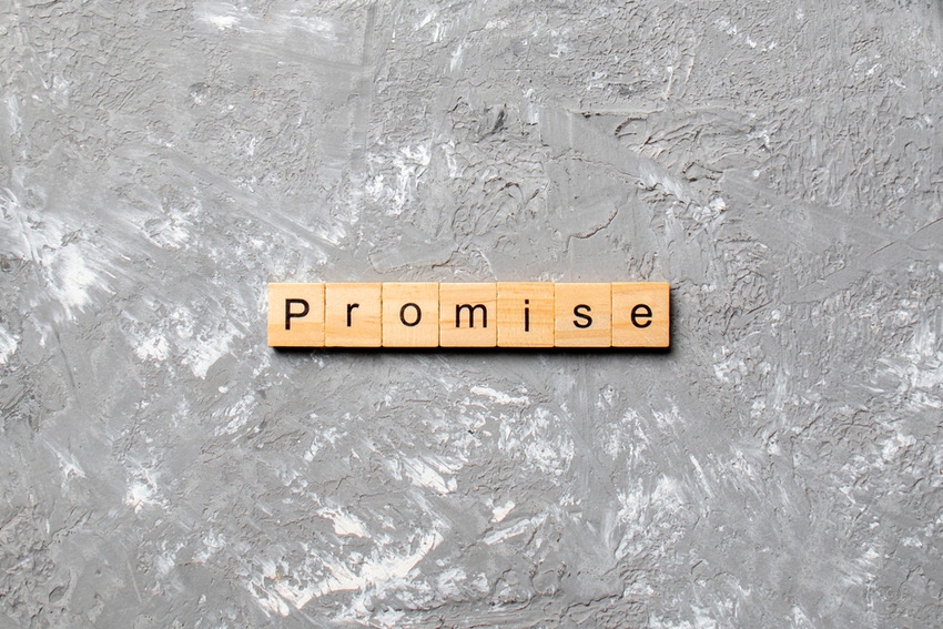Word promise written on wooden tiles