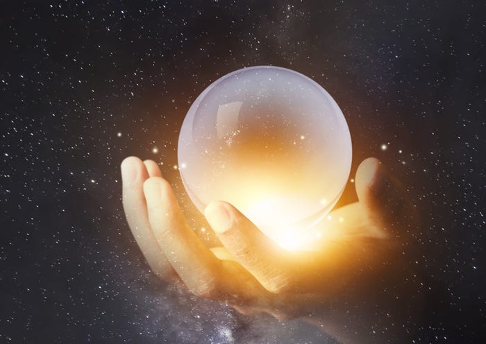 Person holding crystal ball