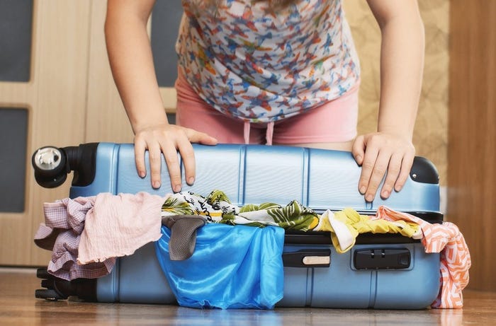 Overfull suitcase Overfull suitcase