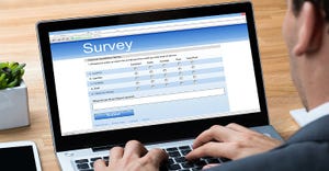 Man completes survey online.