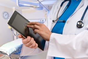 Doctor with Tablet