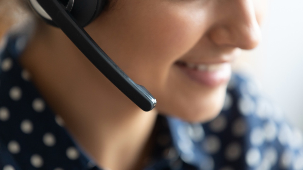 Close-up of call center agent