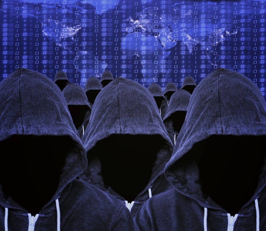 Hooded mass of unknown faceless computer hacker and cyber criminals with a world map of internet usage and binary code