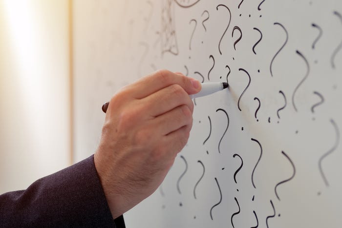 Question Marks on Whiteboard Question Marks on Whiteboard