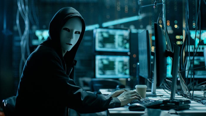Scary Malicious Hacker with Mask