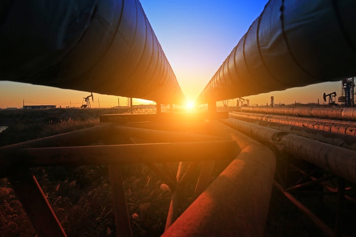 Oil pipeline at sunset