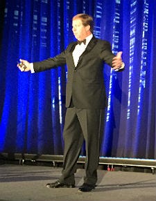 On stage Thursday at PlanetOne's Year-End Event in Scottsdale, Arizona, PlanetOne CEO Ted Schuman talks about some BIG deals.