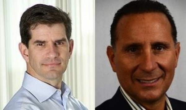 LogMeIn CEO Michael Simon left and Continuum CEO Michael George right are deepening their partnership