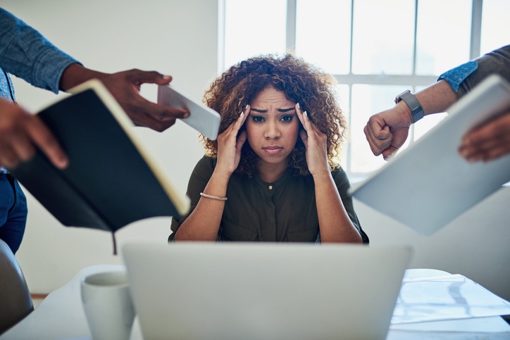 Businesswoman overwhelmed