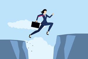 Businesswoman jumping abyss